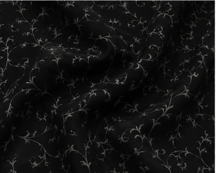 Black Floral Vine Printed Cotton Fabric On the bench