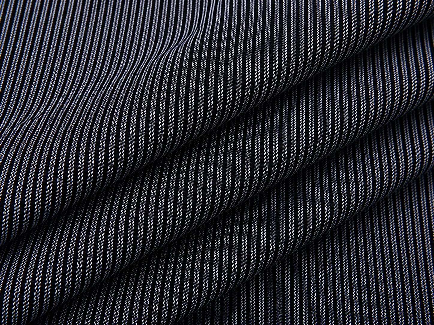 Midnight Black Vertical stripe woven fabric On the bench